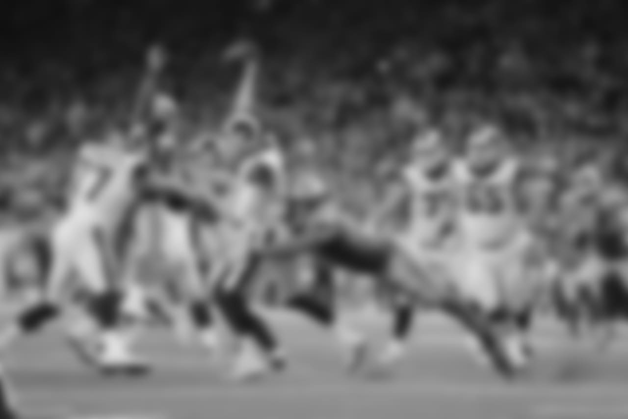 Detroit Lions defensive end Ziggy Ansah (94) hits Los Angeles Rams quarterback Jared Goff (16), forcing an incomplete pass during a NFL football game against the Los Angeles Rams on Sunday, Dec. 2, 2018 in Detroit. (Detroit Lions via AP).