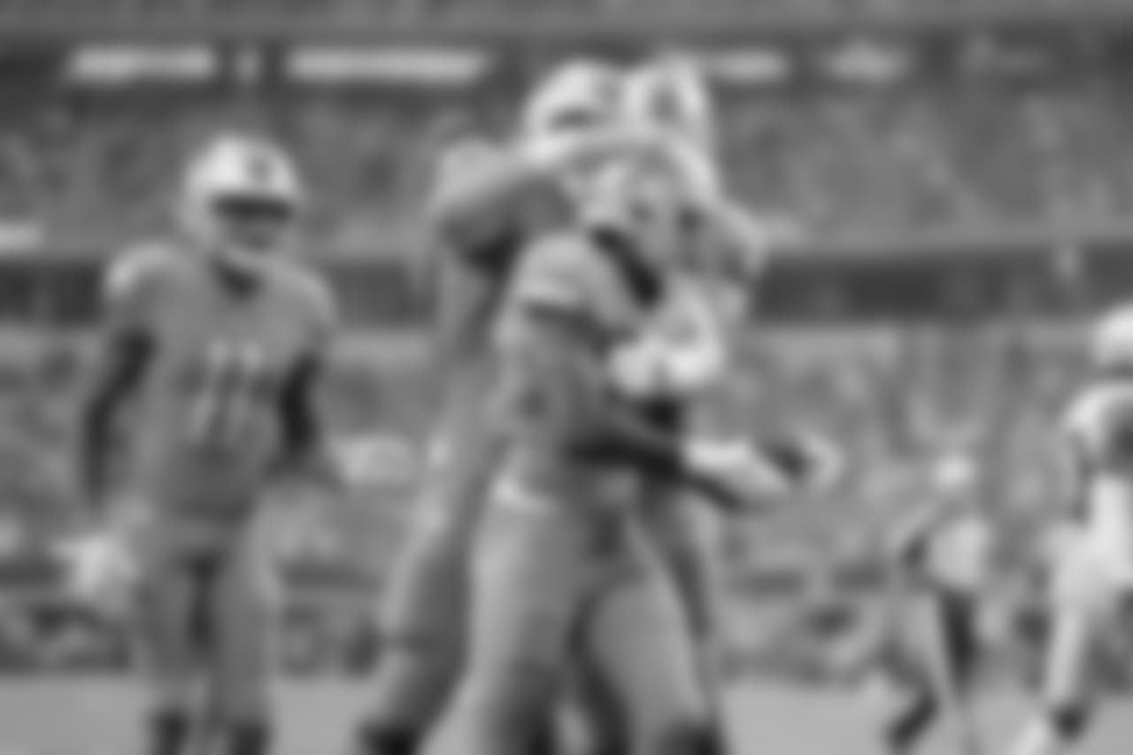 Detroit Lions running back Kerryon Johnson (33) celebrates his first career touchdown with his teammates during a NFL football game against the Dallas Cowboys on Sunday, Sept. 30, 2018 in Arlington, Texas. (Detroit Lions via AP).
