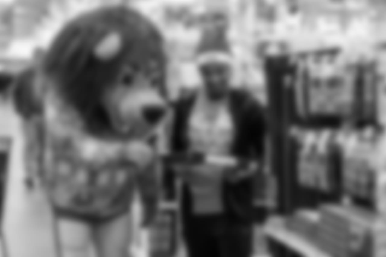 Roary shops with students from Detroit Lions Academy at Shop with a Lion at Meijer on Tuesday, Dec. 4, 2018 in Detroit.