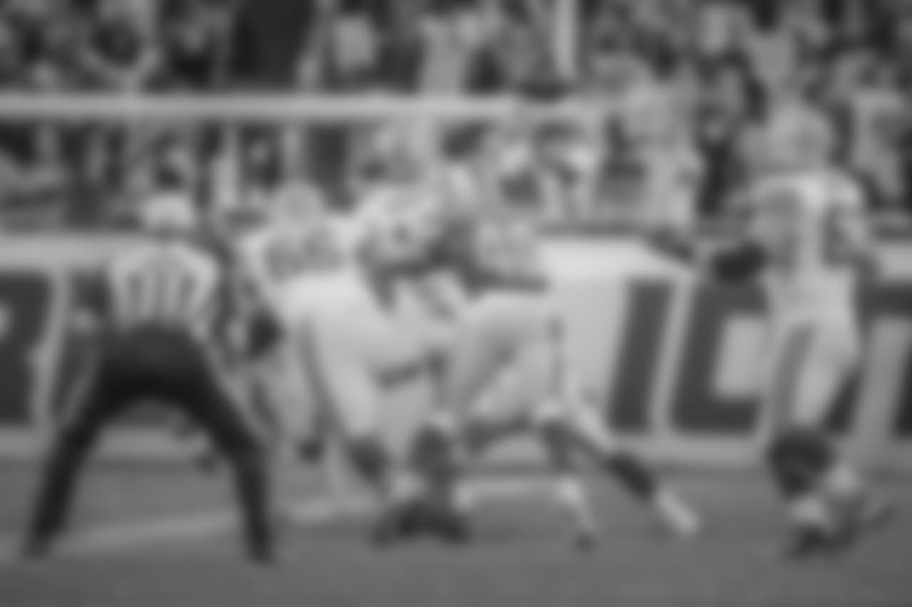 Detroit Lions linebacker Jarrad Davis (40) hits Green Bay Packers quarterback Aaron Rodgers (12), forcing an incompletion during a NFL football game against the Green Bay Packers on Sunday, Oct. 7, 2018 in Detroit.