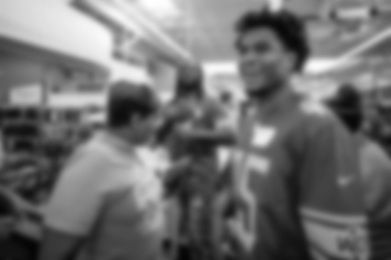 Detroit Lions running back LeGarrette Blount (29) and Detroit Lions safety Charles Washington (45) with students from Detroit Lions Academy at Shop with a Lion at Meijer on Tuesday, Dec. 4, 2018 in Detroit.