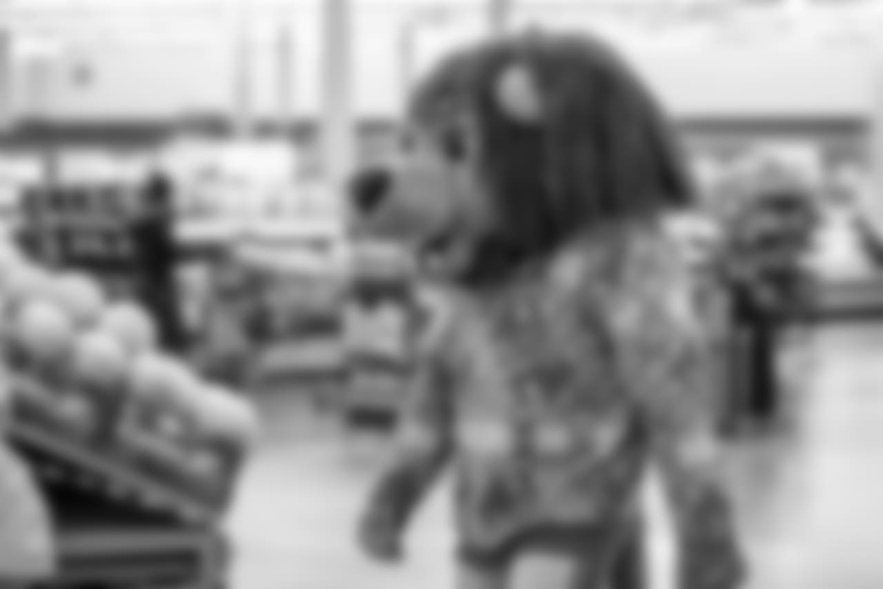 Roary shops with students from Detroit Lions Academy at Shop with a Lion at Meijer on Tuesday, Dec. 4, 2018 in Detroit.