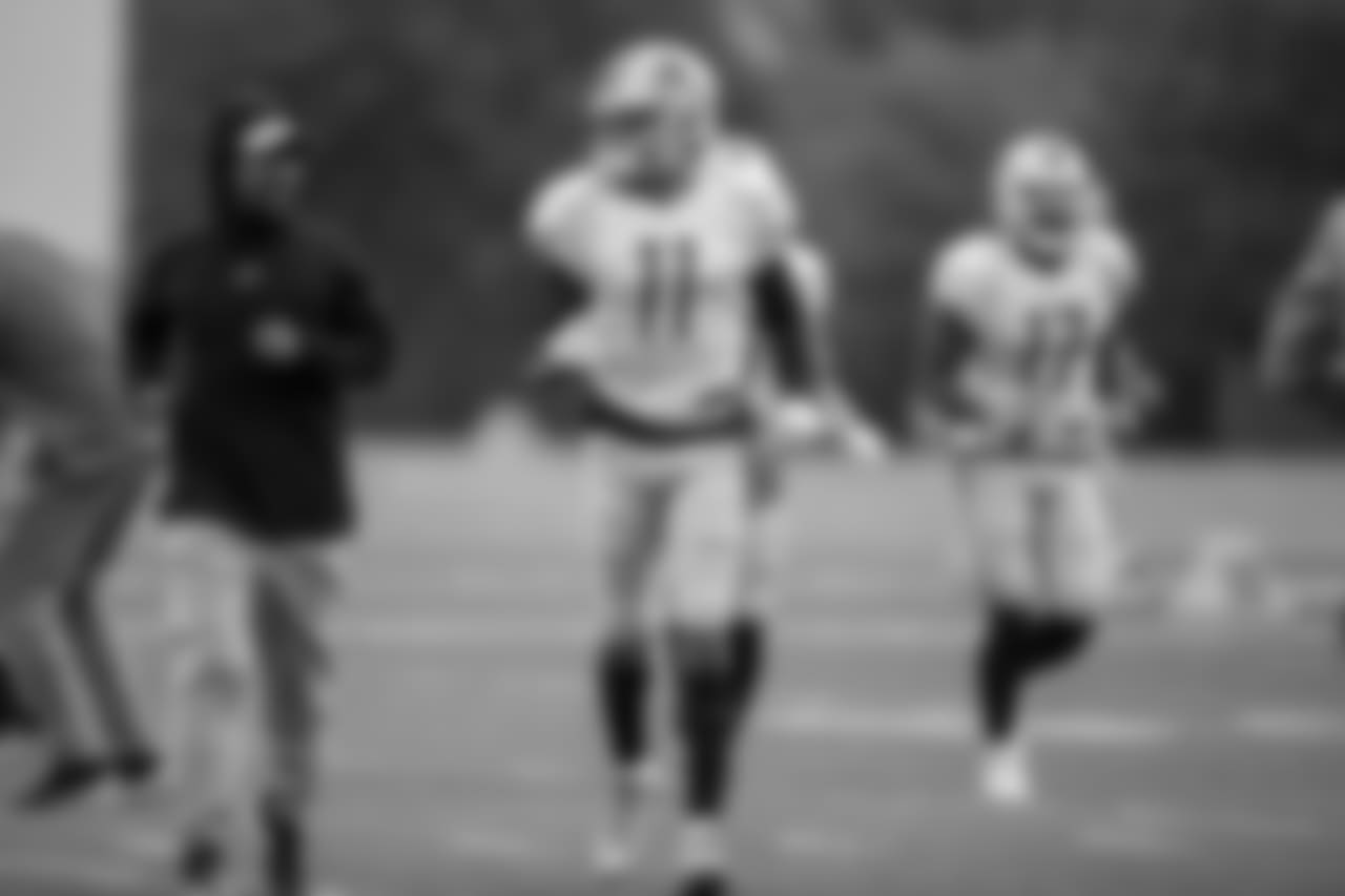 Detroit Lions wide receiver Marvin Jones Jr. (11) and Detroit Lions wide receiver coach Robert Prince head to a drill during practice at the Detroit Lions training facility on Wednesday, Oct. 17, 2018 in Allen Park, Mich. (Detroit Lions via AP)