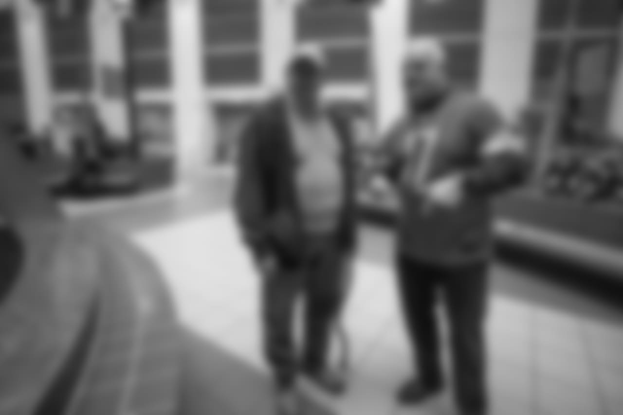 Eric Hipple visits with patients and families at the John D. Dingell VA Medical Center on Tuesday, Nov. 6, 2018 in Detroit.