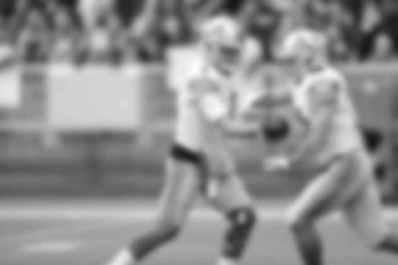 Detroit Lions quarterback Matthew Stafford (9) hands off to Detroit Lions running back Zach Zenner (34) before a NFL football game against the Green Bay Packers on Sunday, Dec. 30, 2018 in Green Bay, Wisc. (Detroit Lions via AP).