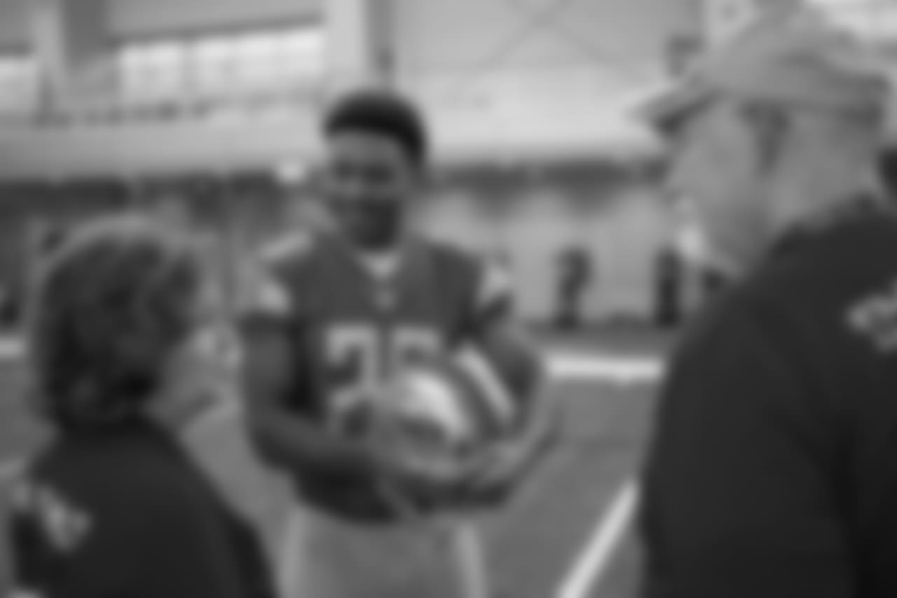 Detroit Lions cornerback DeShawn Shead (26) meets with families from Tragedy Assistance Program For Survivors (TAPS) after the team's walkthrough at the Detroit Lions training facility on Saturday, Nov. 17, 2018 in Allen Park, Mich. (Detroit Lions via AP)
