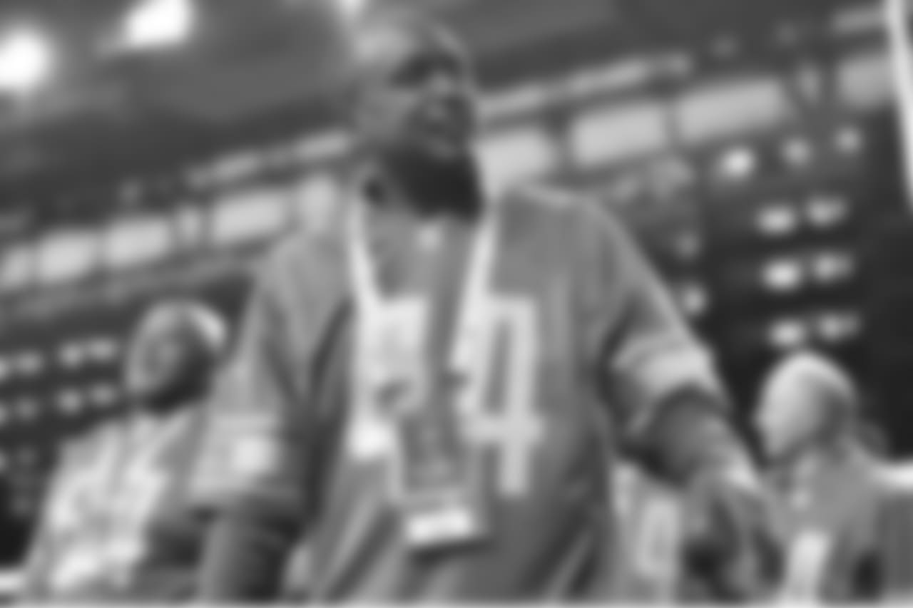 Lions Legends leave the field following the Pride of the Lions halftime induction ceremony during a NFL football game against the Seattle Seahawks on Sunday, Oct. 28, 2018 in Detroit. (Detroit Lions via AP).