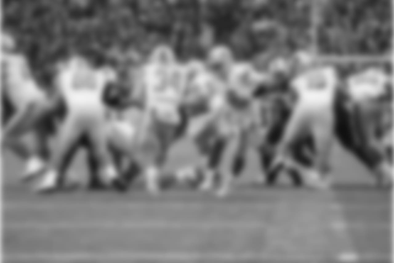 Detroit Lions quarterback Matthew Stafford (9) hands off to Detroit Lions running back Zach Zenner (34) during a NFL football game against the Buffalo Bills on Sunday, Dec. 16, 2018 in Orchard Park, N.Y. (Detroit Lions via AP).
