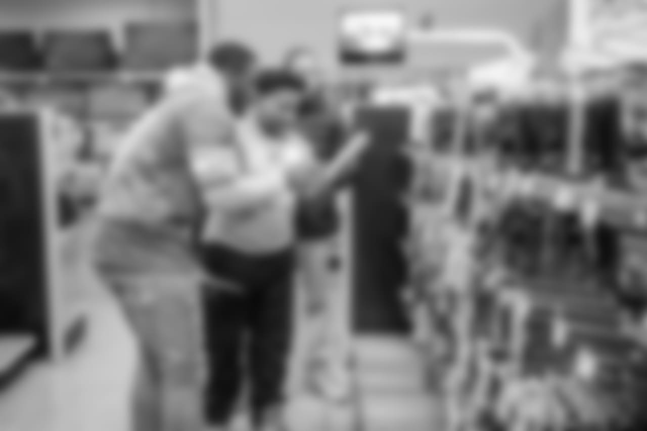 Detroit Lions wide receiver Andy Jones (17) with students from Detroit Lions Academy at Shop with a Lion at Meijer on Tuesday, Dec. 4, 2018 in Detroit.
