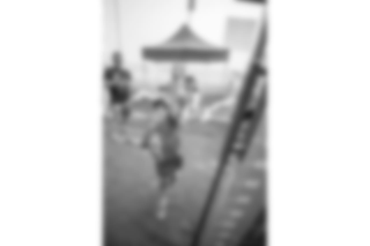 A young fan tries out the vertical jump during Detroit Lions training camp practice on Tuesday, Aug. 14, 2018 in Allen Park, Mich. (Detroit Lions via AP)