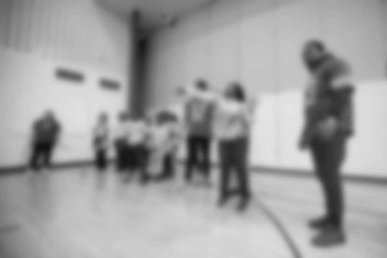 Detroit Lions defensive lineman Da'Shawn Hand (93) at a real players don't bully assembly with Playworks at Hutchinson Elementary School on Tuesday, Oct. 22, 2018 in Detroit.