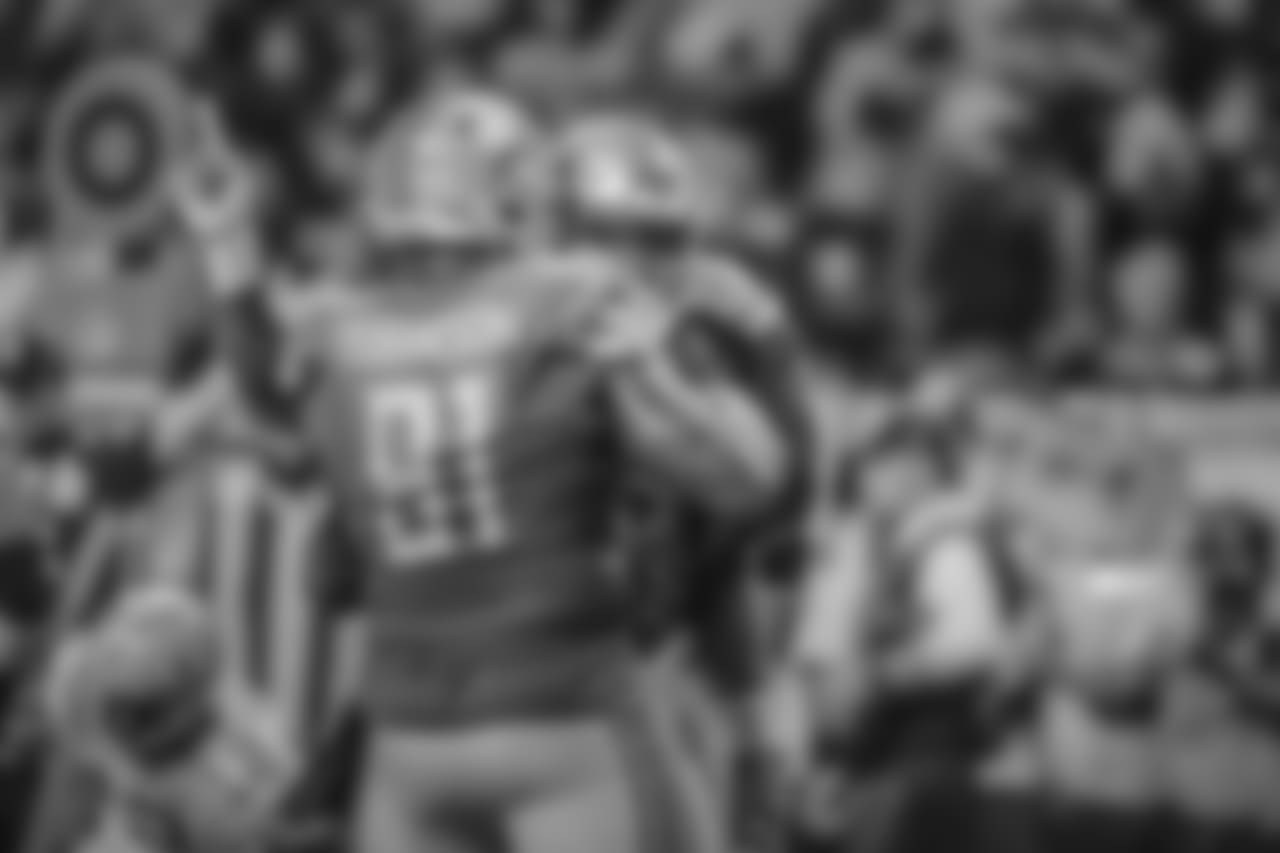 Detroit Lions defensive tackle A'Shawn Robinson (91) and Detroit Lions defensive end Romeo Okwara (95) celebrate a strip sack during a NFL football game against the Green Bay Packers on Sunday, Oct. 7, 2018 in Detroit.