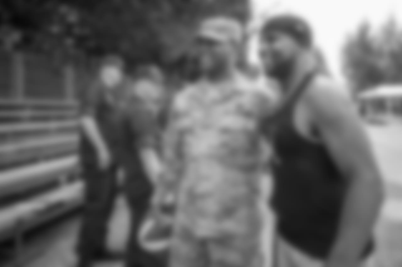 Detroit Lions wide receiver Golden Tate visits with military members following training camp practice on Wednesday, Aug. 8, 2018 in Napa, Calif. (Detroit Lions via AP)