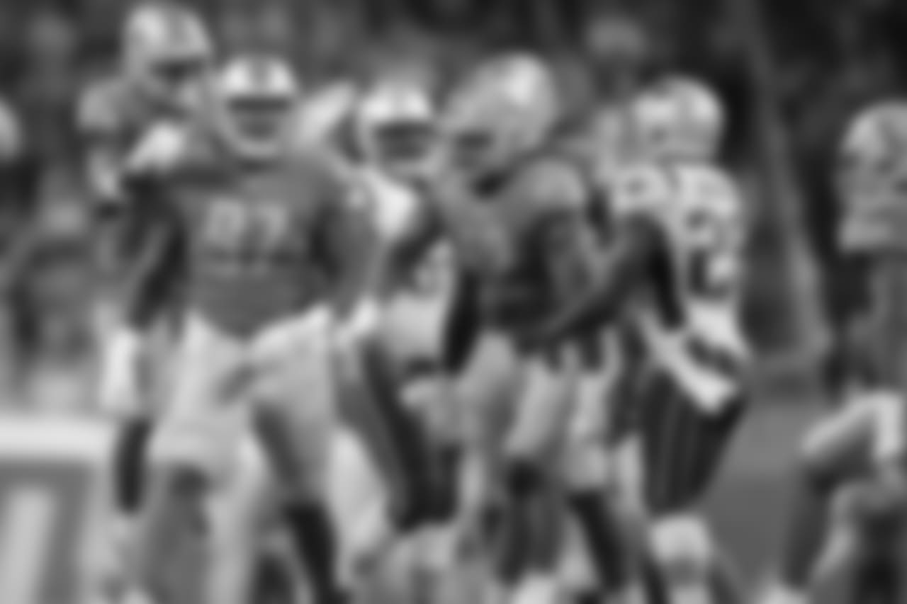 Detroit Lions defensive tackle Ricky Jean Francois (97) and the defense celebrate a stop during a NFL football game against the New England Patriots on Sunday, Sept. 23, 2018 in Detroit. (Detroit Lions via AP).