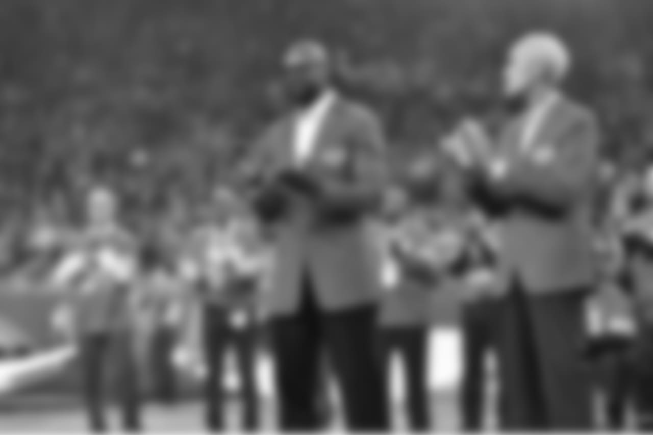 Herman Moore and Roger Brown during the Pride of the Lions induction ceremony during halftime of a NFL football game against the Seattle Seahawks on Sunday, Oct. 28, 2018 in Detroit. (Detroit Lions via AP).
