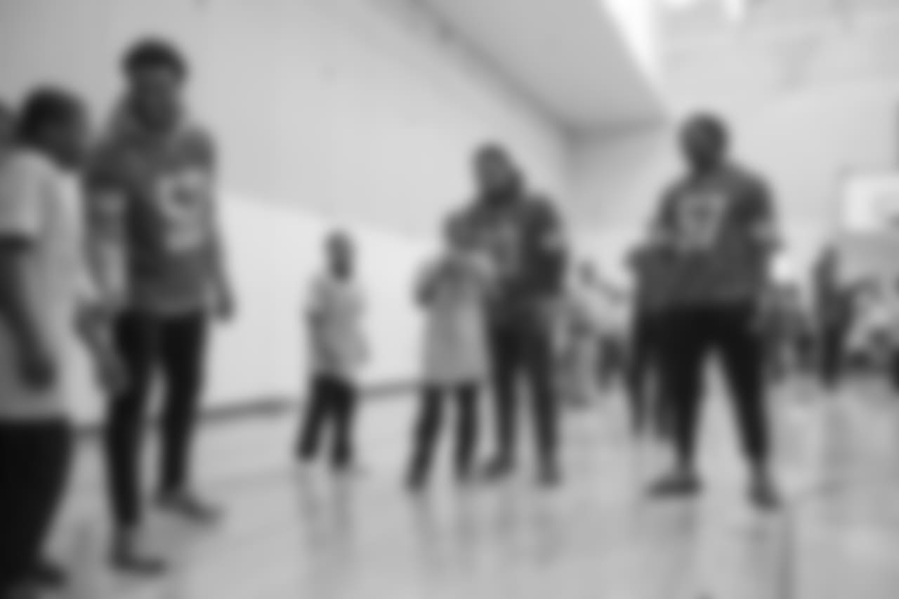 Detroit Lions linebacker Christian Jones (52), Detroit Lions defensive lineman Da'Shawn Hand (93) and Detroit Lions linebacker Eli Harold (57) at a real players don't bully assembly with Playworks at Hutchinson Elementary School on Tuesday, Oct. 22, 2018 in Detroit.