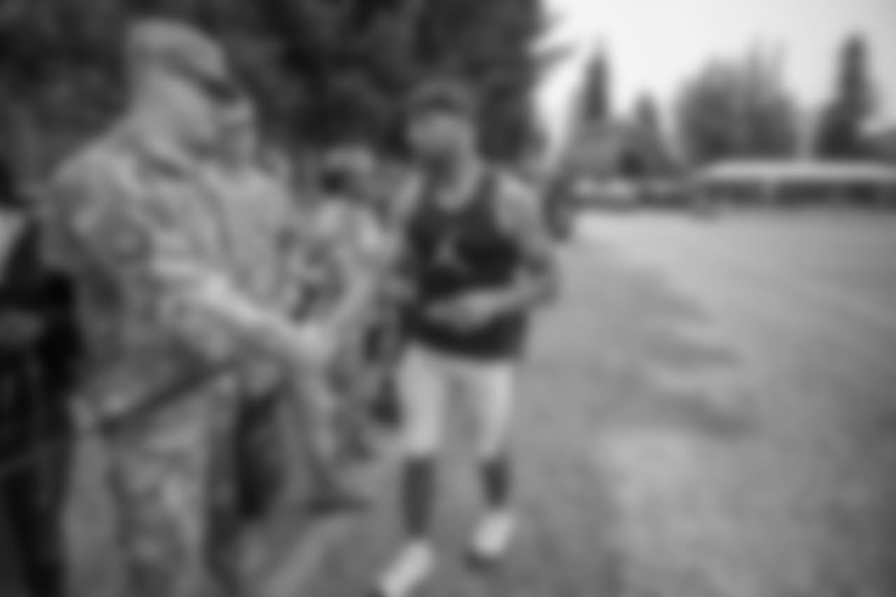 Detroit Lions wide receiver Golden Tate visits with military members following training camp practice on Wednesday, Aug. 8, 2018 in Napa, Calif. (Detroit Lions via AP)