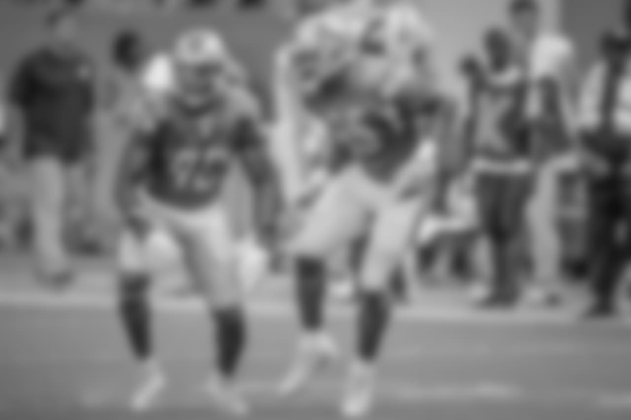 Detroit Lions linebacker Jarrad Davis (40) and Detroit Lions defensive end Romeo Okwara (95) celebrate a sack during a NFL football game against the Miami Dolphins on Sunday, Oct. 21, 2018 in Miami Gardens, Fla. (Detroit Lions via AP).