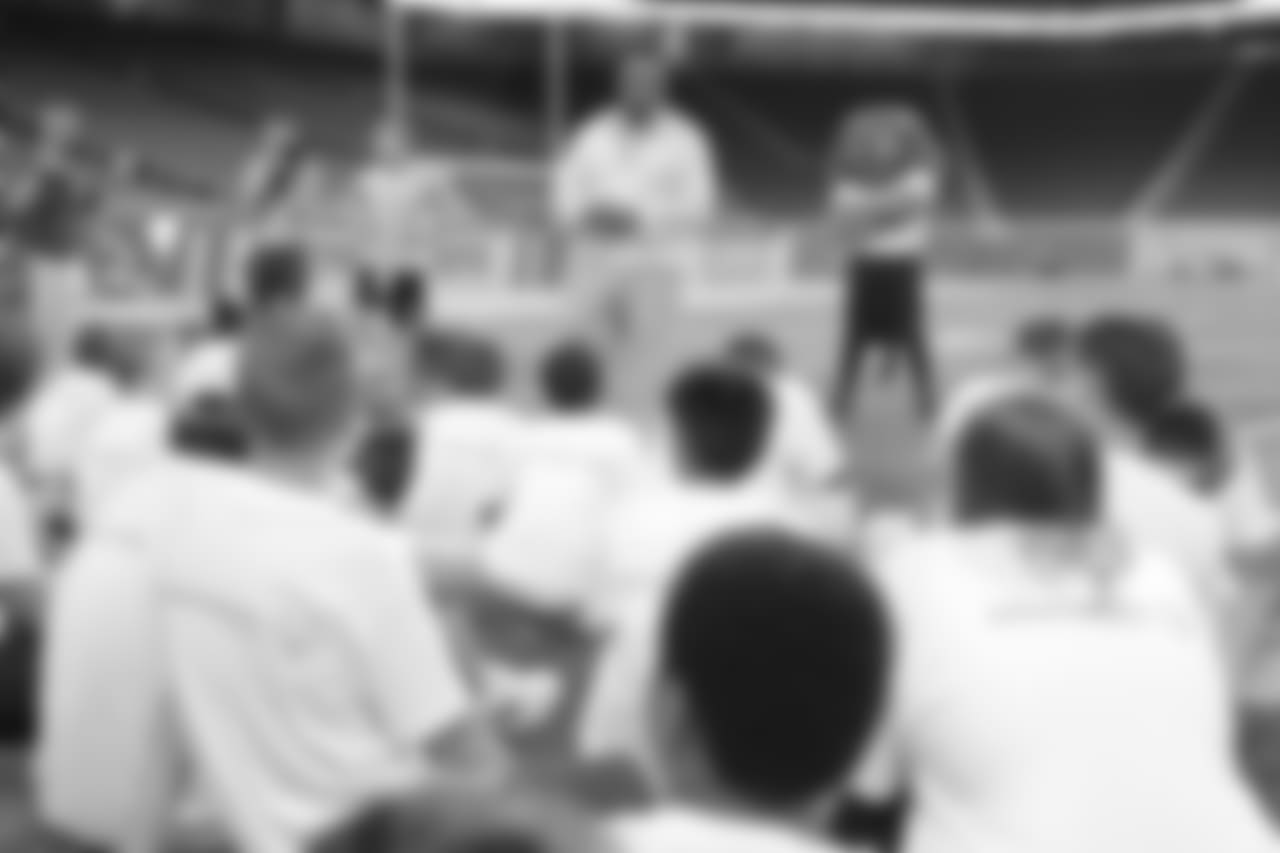 Former Detroit Lions running back Barry Sanders speaks to kids from special olympics Michigan at the blue cross blue shield of michigan play like a lion clinic before a NFL football game against the New York Giants on Friday, Aug. 17, 2018 in Detroit. (Detroit Lions via AP).