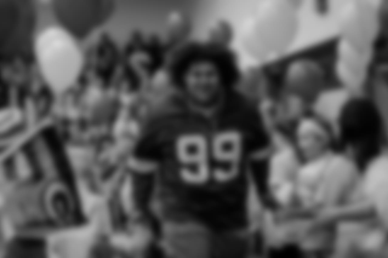Green Bay Packers players take part during a Play 60 Super School visit at Weyauwega-Fremont High School in Weyauwega on Tuesday.