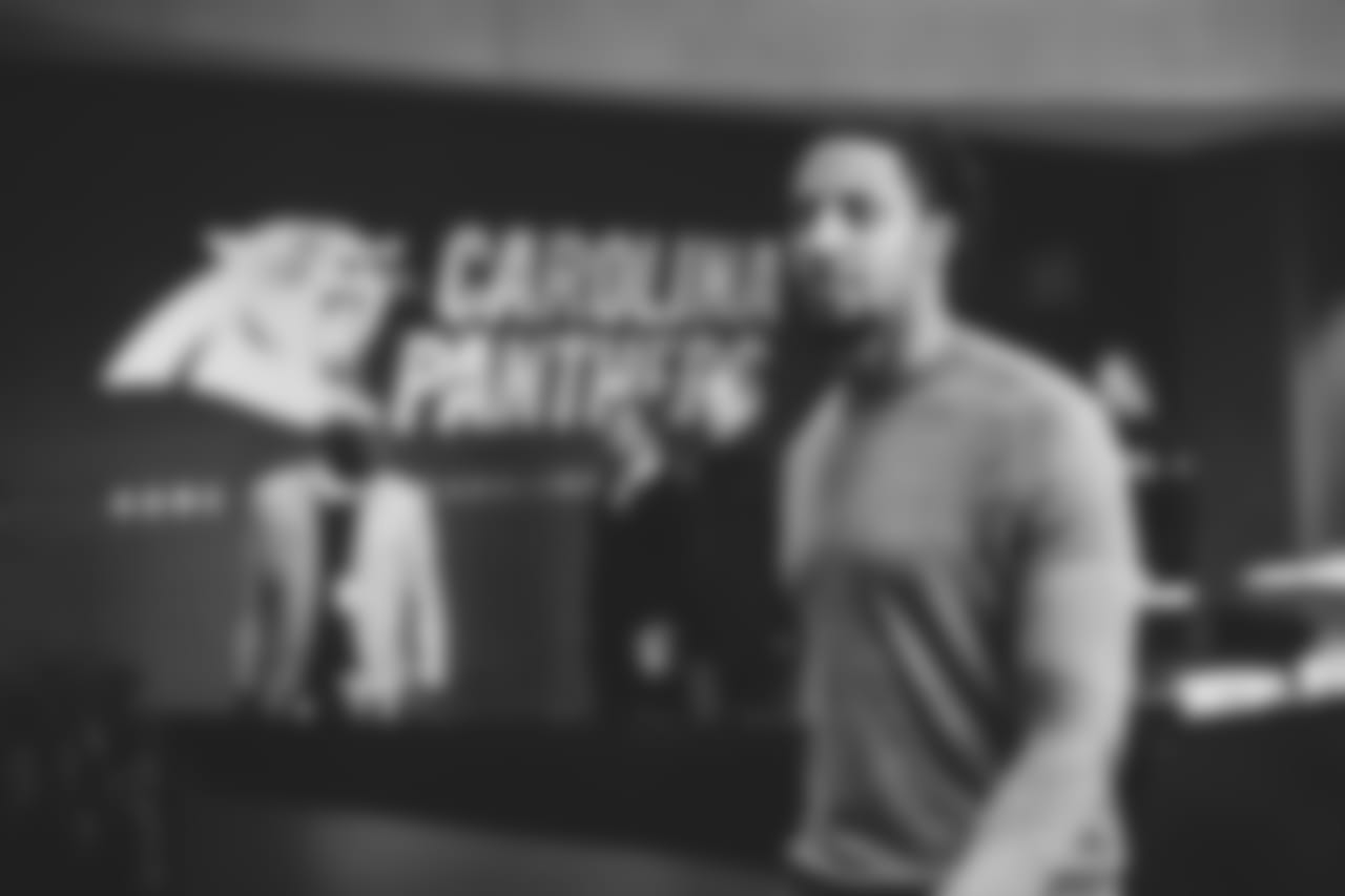 Eric Reid and family at Bank of America Stadium on Monday, Feb. 11, 2019 after signing a three-year contract extension.