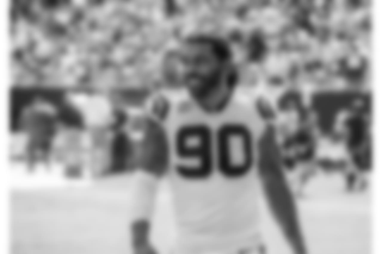 Julius Peppers walks off the field during the game against the Giants on Sun., Oct. 7, 2018.