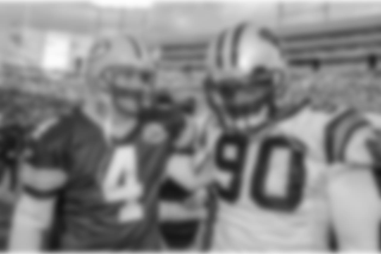 Julius Peppers and Brett Favre after a game against the Green Bay Packers at Lambeau Field on Sunday, November 18, 2007.