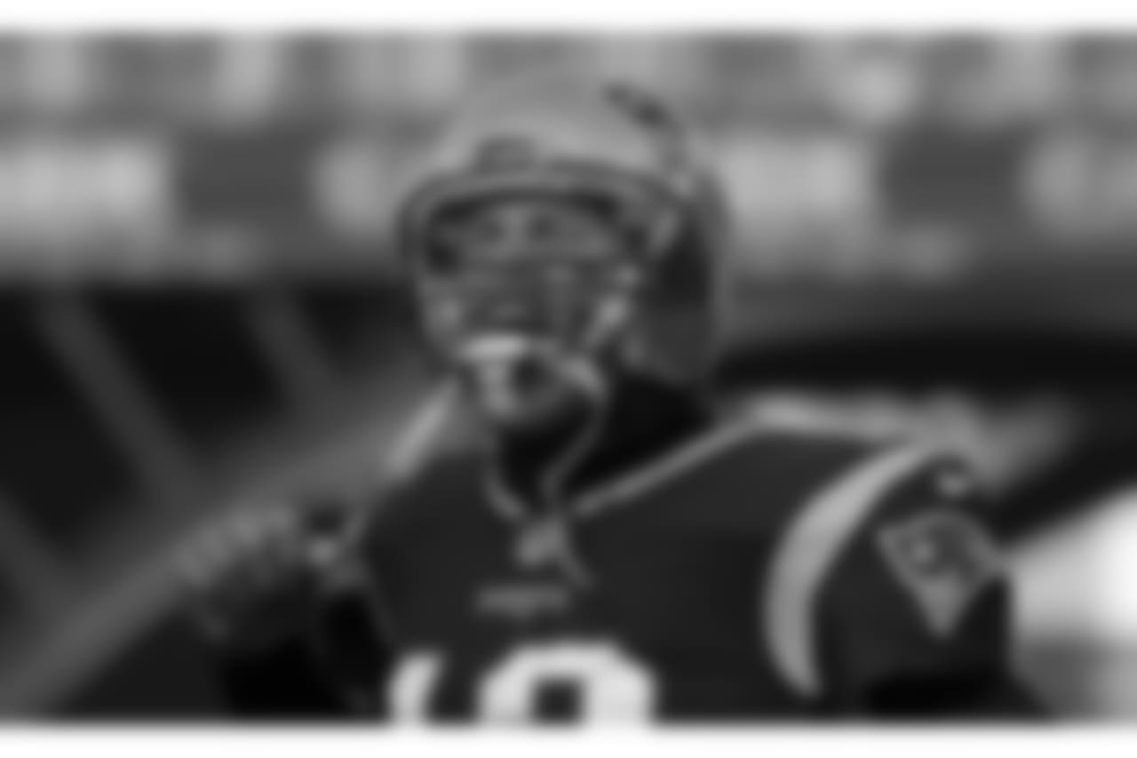 New England Patriots quarterback Tom Brady charges onto the field before an NFL divisional playoff football game against the Los Angeles Chargers, Sunday, Jan. 13, 2019, in Foxborough, Mass. (AP Photo/Charles Krupa)