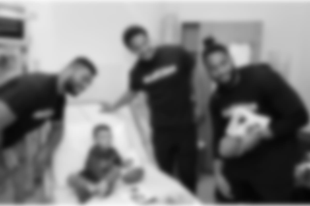 BOSTON, MA - MAY 16: New England Patriots (L to R) Kyle Van Noy, Derek Rivers, and Harvey Langi visit Benjamin at Boston Children's Hospital on May 16, 2018 in Boston, Massachusetts. (Photo by Darren McCollester/Getty Images for Boston Children's Hospital)