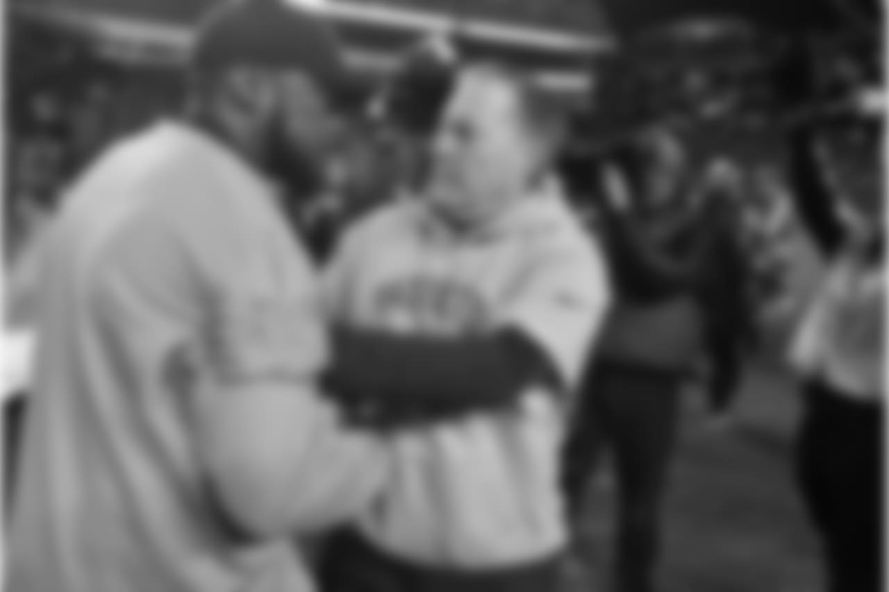 Pittsburgh Steelers head coach Mike Tomlin, left, and New England Patriots head coach Bill Belichick talk on the field following an NFL football game in Pittsburgh, Sunday, Dec. 16, 2018. The Steelers won 17-10. (AP Photo/Don Wright)