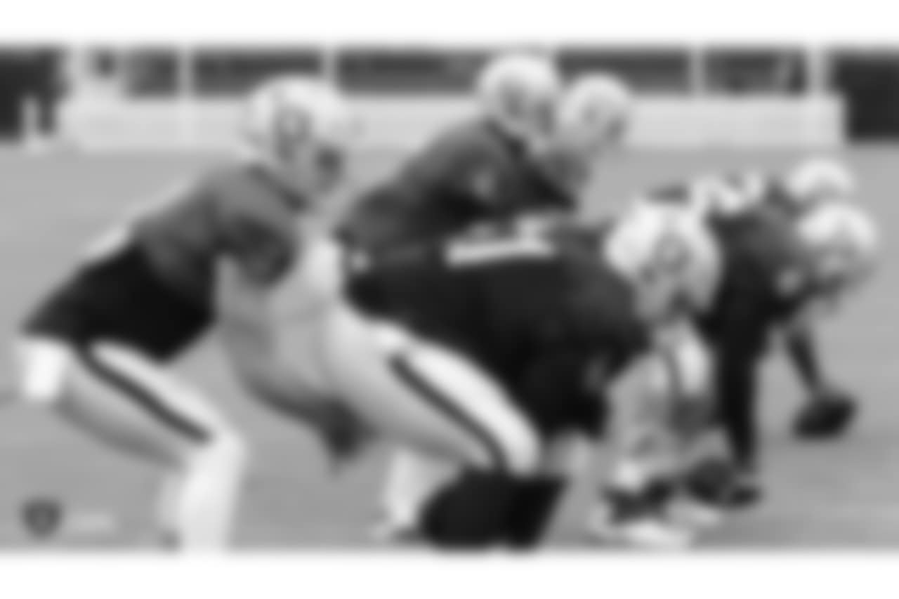 Oakland Raiders quarterbacks and centers on the field for practice at 2018 Training Camp at The Oakland Raiders Napa Valley Training Complex, Monday, August 13, 2018, in Napa, California.