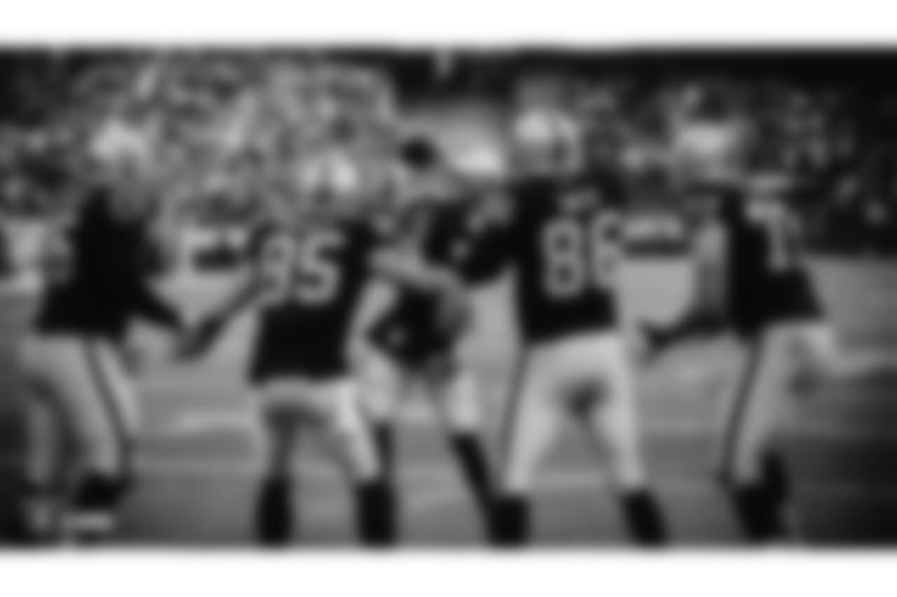 Oakland Raiders guard/center Jon Feliciano (76), tight end Derek Carrier (85), quarterback Derek Carr (4), tight end Lee Smith (86), and tackle Kolton Miller (77) during the Oakland Raiders regular season game against the Pittsburgh Steelers at Oakland-Alameda County Coliseum, Sunday, December 9, 2018, in Oakland, California. The Oakland Raiders won 24-21.