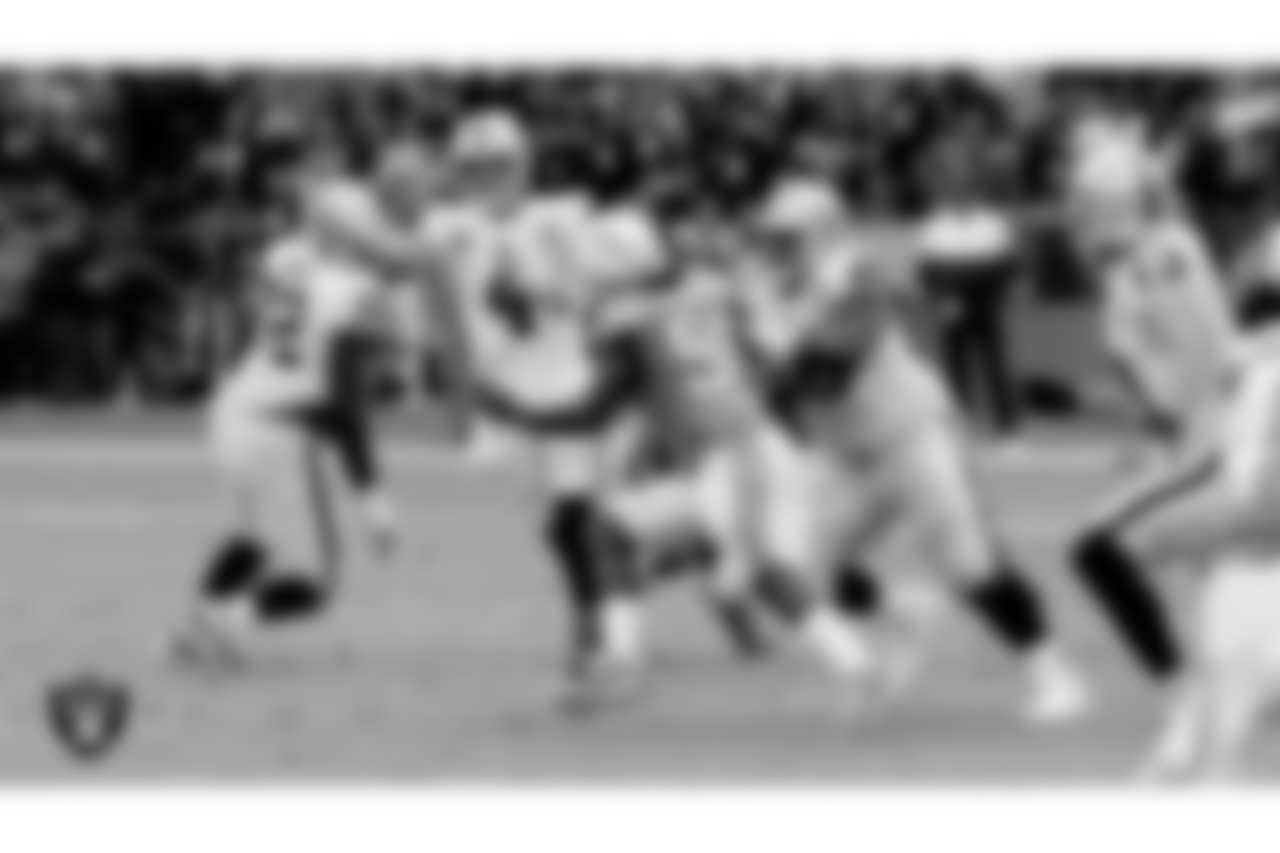 Raiders quarterback Derek Carr (4) passes as guard Gabe Jackson (66) blocks during the regular season away game against the Los Angeles Chargers at ROKiT Field at Dignity Health Sports Park, Sunday, December 22, 2019.