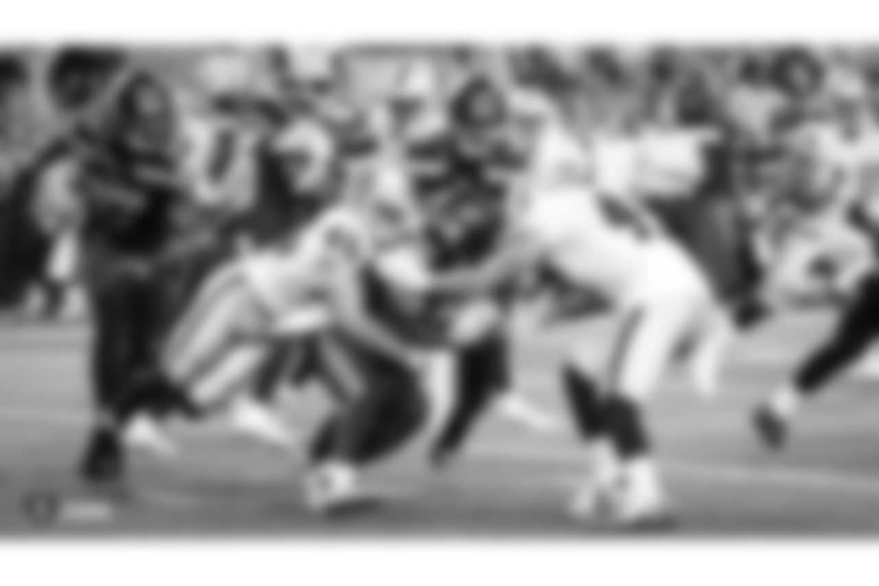 Oakland Raiders safety Dallin Leavitt (45) and defensive end James Cowser (47) during The Oakland Raiders preseason game against the Seattle Seahawks at CenturyLink Field, Thursday, August 30, 2018, in Seattle, Washington. The Oakland Raiders won 30-19.