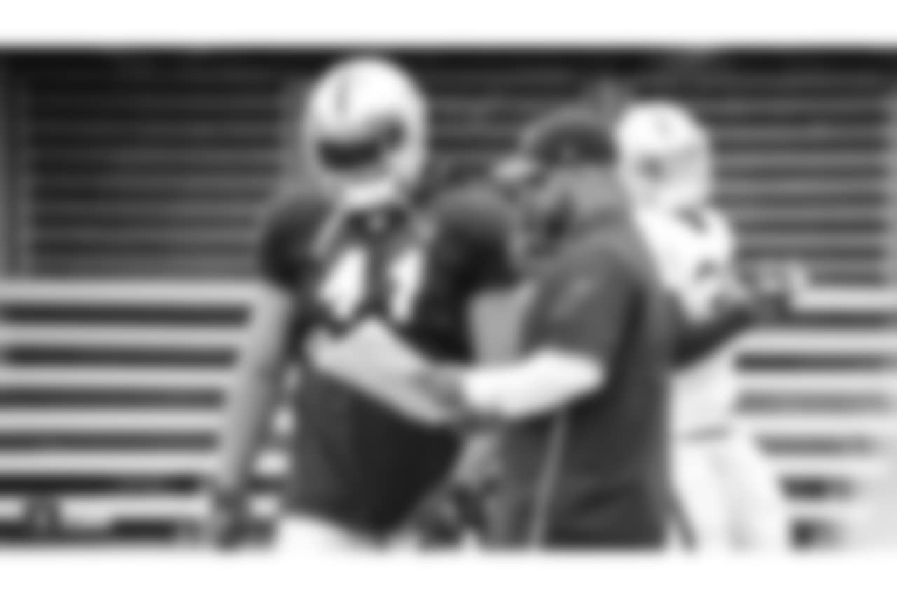 Oakland Raiders running backs coach Jemal Singleton and fullback Keith Smith (41) on the field for practice at 2018 Training Camp at The Oakland Raiders Napa Valley Training Complex, Tuesday, August 14, 2018, in Napa, California.