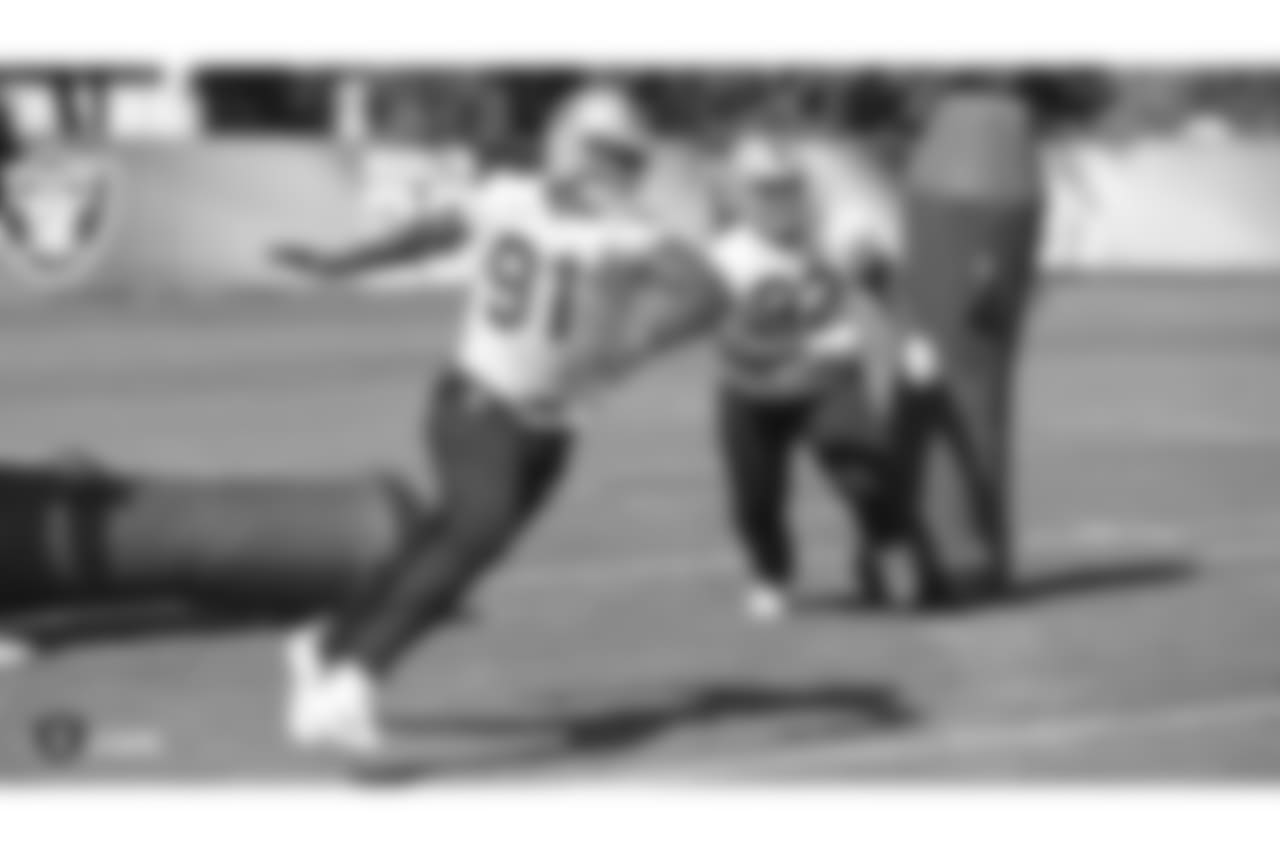Oakland Raiders linebacker Shilique Calhoun (91) and defensive tackle PJ Hall (92) on the field for practice at the Oakland Raiders Practice Facility, Wednesday, October 10, 2018, in Alameda, California.