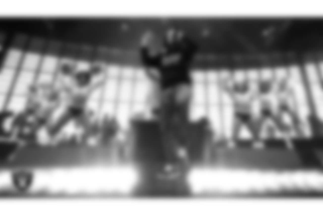 Rapper T.I. performs during halftime at the Las Vegas Raiders' regular season home game against the New England Patriots at Allegiant Stadium.