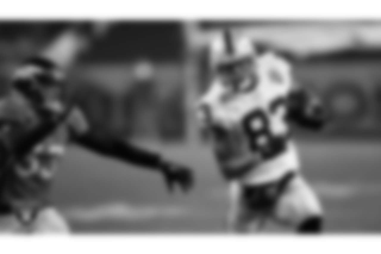 Las Vegas Raiders tight end Darren Waller (83) runs after making a catch during the regular season away game against the Denver Broncos.