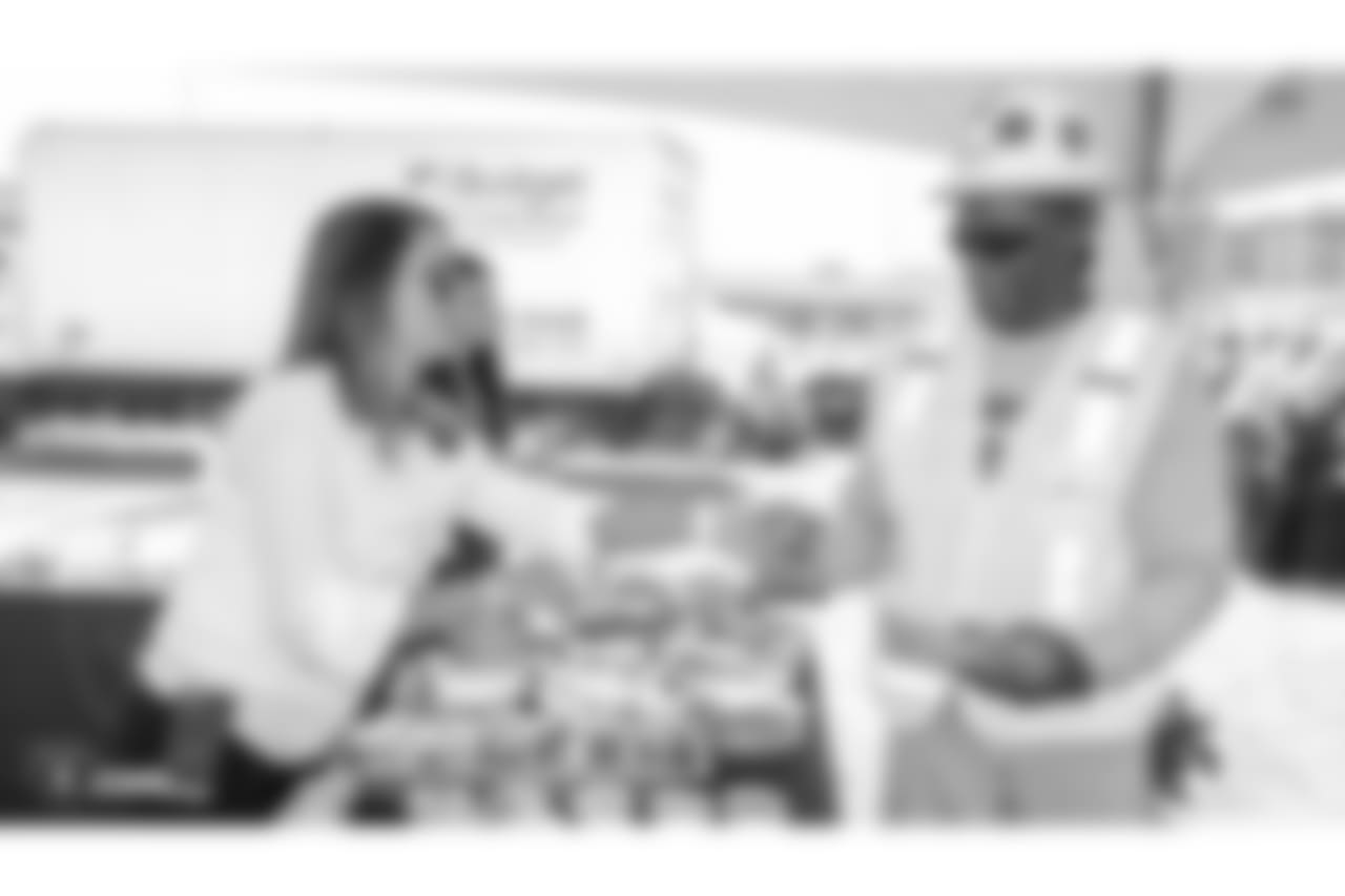 Raiders owner Mark Davis, president Marc Badain, and staff members from the Raiders front office spend the day with construction workers of the Las Vegas Stadium worksite by handing out lunches and sharing a meal, Thursday, September 27, 2018, at the Las Vegas Stadium worksite in Las Vegas, Nevada.