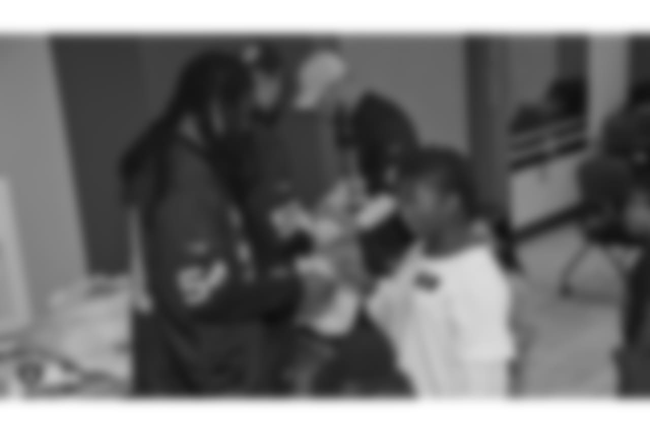 Oakland Raiders defensive tackle Clinton McDonald and his Light Into Darkness Foundation, along with linebacker Emmanuel Lamur, linebacker Kyle Wilber, punter Johnny Townsend, defensive tackle Frostee Rucker, and fullback Ryan Yurachek, partner with the nonprofit First Book by hosting a reading party to promote literacy at the West Oakland Youth Center, Tuesday, December 11, 2018, in Oakland, California.
