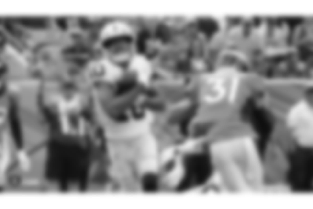 A series of photos from past contests between the Raiders and Broncos leading up to their last matchup in Week 2 of the 2018 season, which the Raiders lost 20-19.
