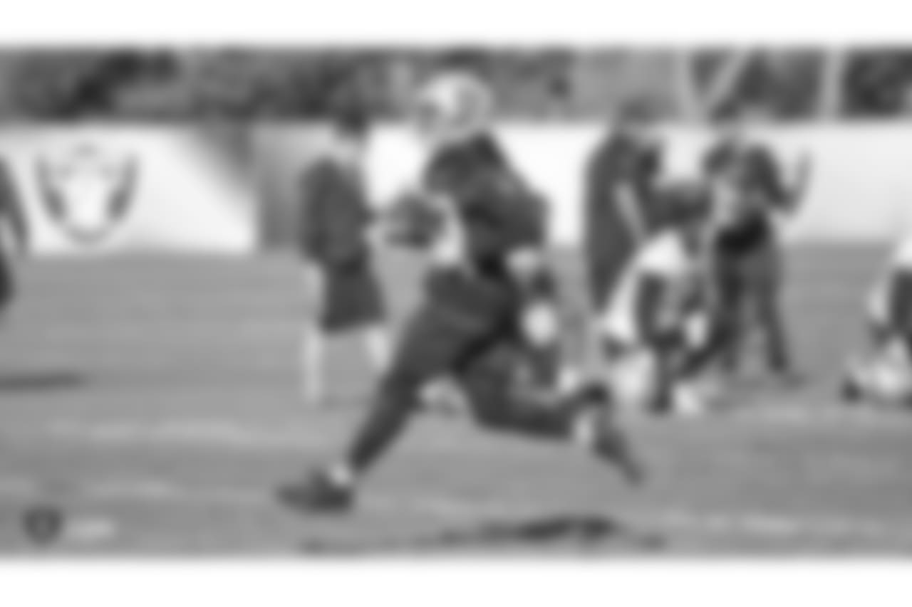 Oakland Raiders running back DeAndré Washington (33) on the field for practice at the Oakland Raiders Practice Facility, Friday, November 30, 2018, in Alameda, California.