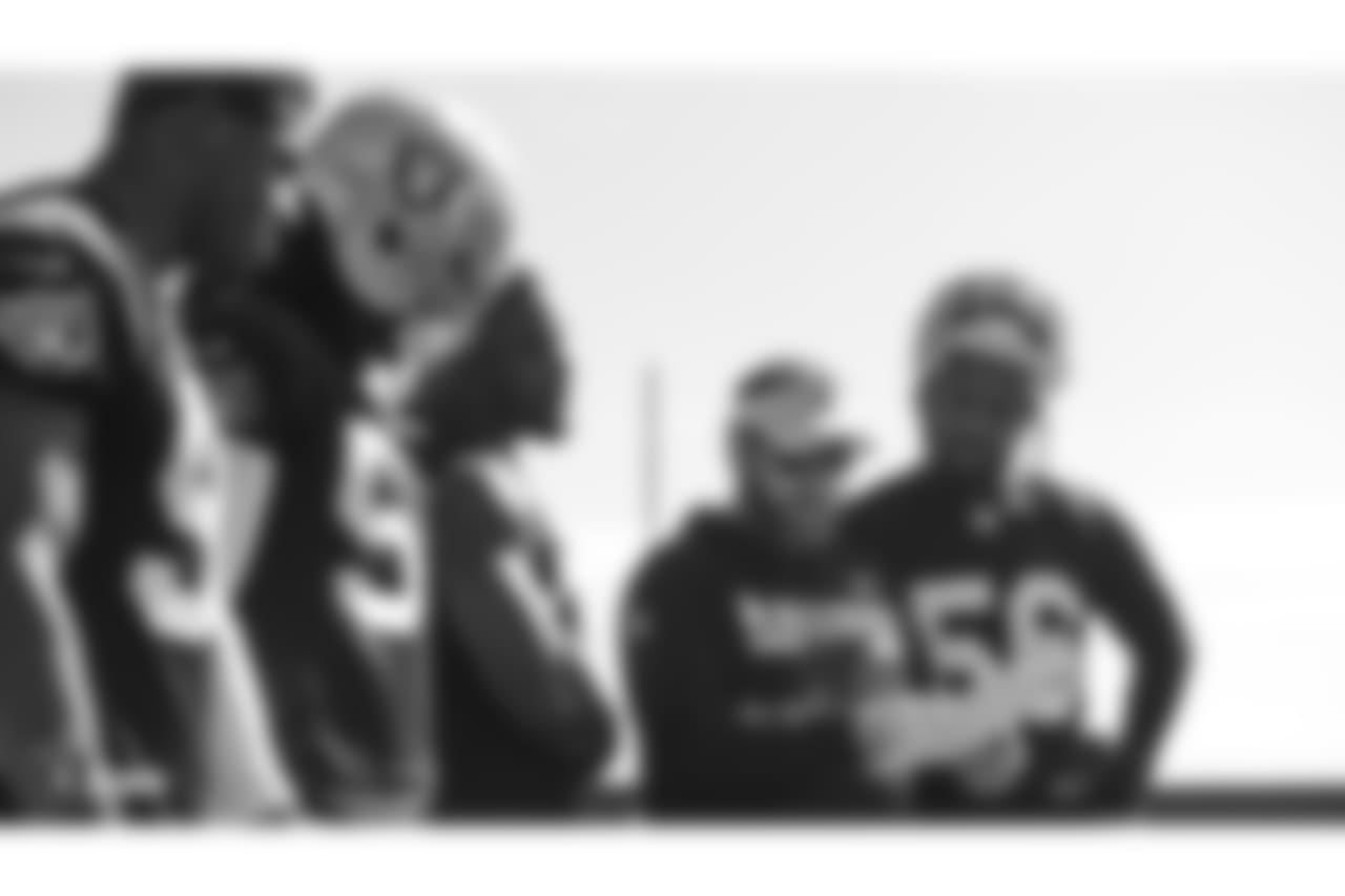 Oakland Raiders linebacker Marquel Lee (55), linebacker Emmanuel Lamur (54), linebacker Tahir Whitehead (59), linebackers coach David Lippincott, and linebacker Derrick Johnson (56) on the field for practice at the Oakland Raiders Practice Facility, Friday, October 5, 2018, in Alameda, California.