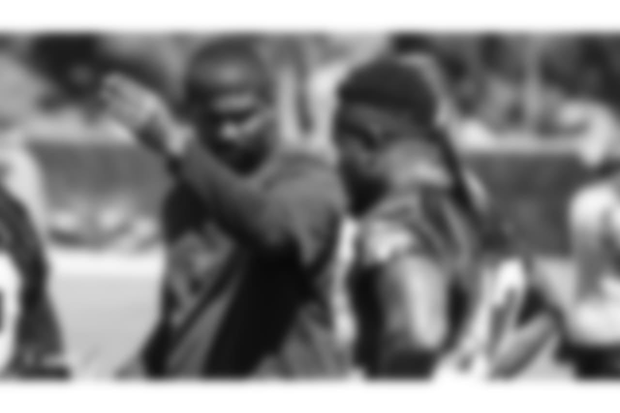 Oakland Raiders defensive backs coach Derrick Ansley and strong safety Karl Joseph (42) at an Organized Team Activity (OTA) at the Oakland Raiders Practice Facility, Monday, June 4, 2018, in Alameda, California.