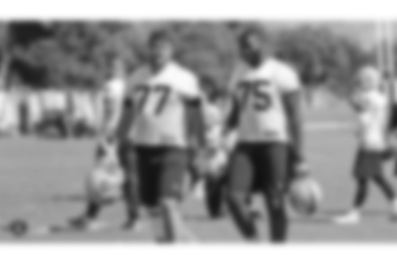 Oakland Raiders offensive tackle Kolton Miller (77) and offensive tackle Brandon Parker (75) on the field for practice at the Oakland Raiders Practice Facility, Friday, October 5, 2018, in Alameda, California.