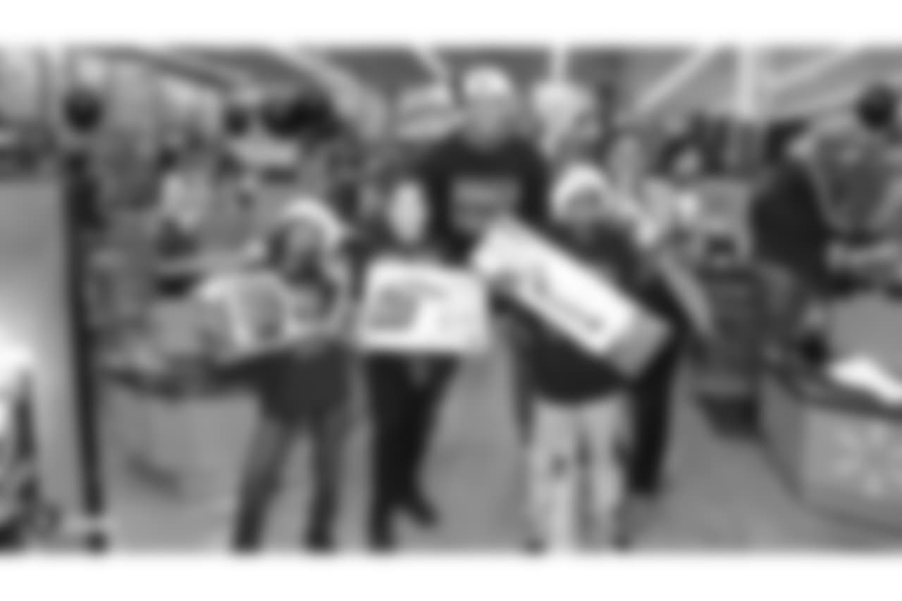 Donald Penn's SHOP WITH A JOCK gives 25 kids from the East Oakland Youth Development Center a chance to fulfill their holiday wish list by receiving a $300 Walmart gift card and a chance to go on an shopping spree with Oakland Raiders tackle Donald Penn at Walmart, Tuesday, December 18, 2018, in San Leandro, California. Joining tackle Donald Penn are guard/tackle Kelechi Osemele, guard Cameron Hunt, tackle Brandon Parker, tackle Jamar McGloster, punter Johnny Townsend, fullback Ryan Yurachek, tight end Darren Waller, tight end Paul Butler, and defensive tackle Clinton McDonald.