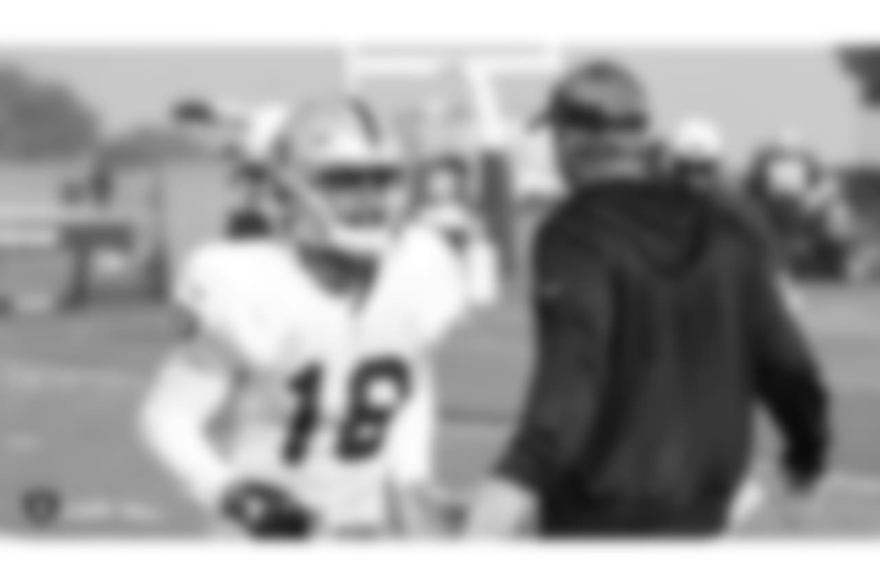 Oakland Raiders wide receiver Rashard Davis (18) and head coach Jon Gruden on the field for practice at the Oakland Raiders Practice Facility, Wednesday, November 14, 2018, in Alameda, California.