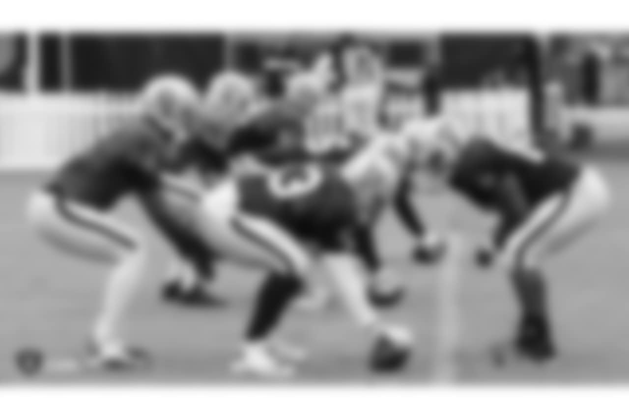 Oakland Raiders centers and quarterbacks on the field for practice at 2018 Training Camp at The Oakland Raiders Napa Valley Training Complex, Tuesday, August 14, 2018, in Napa, California.