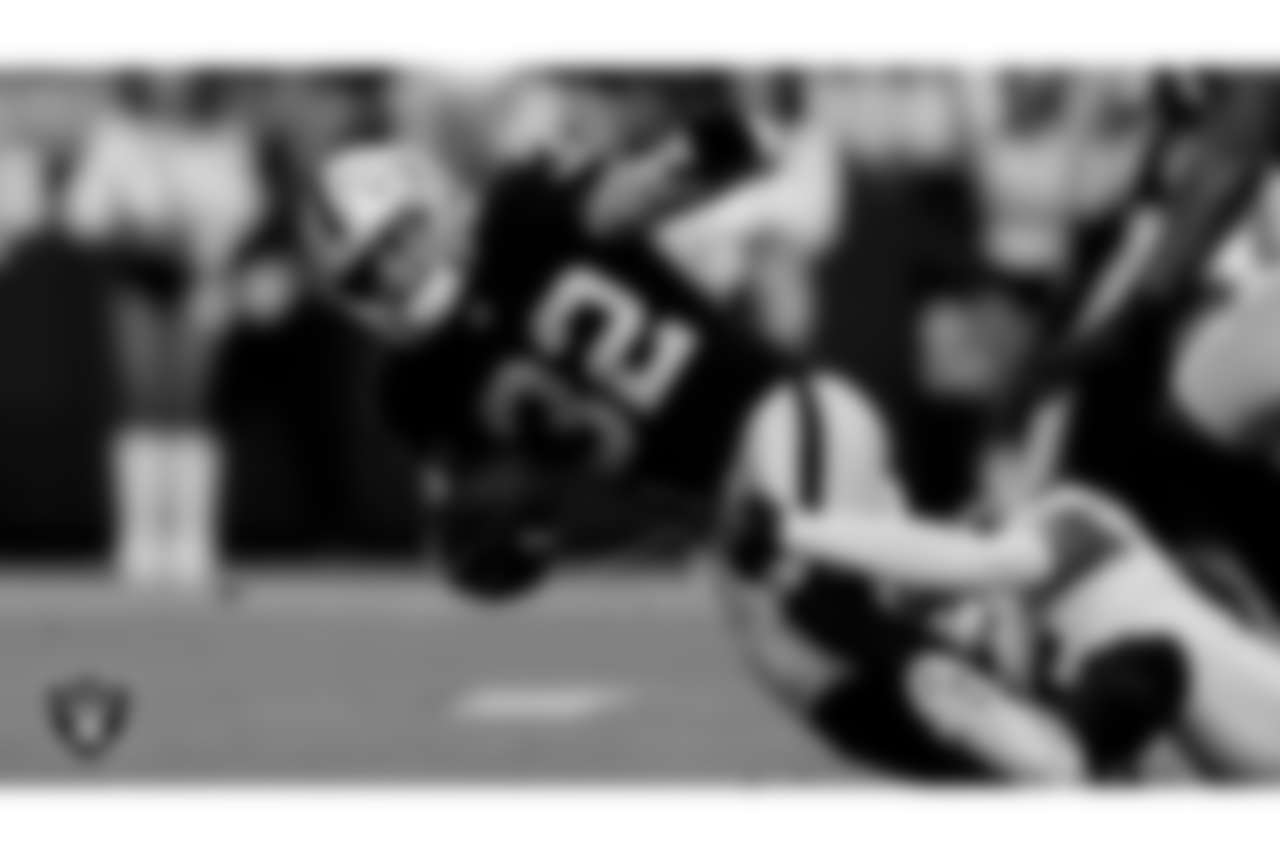 Las Vegas Raiders safety Dallin Leavitt (32) returns a fumble during the regular season home game against the Cincinnati Bengals.