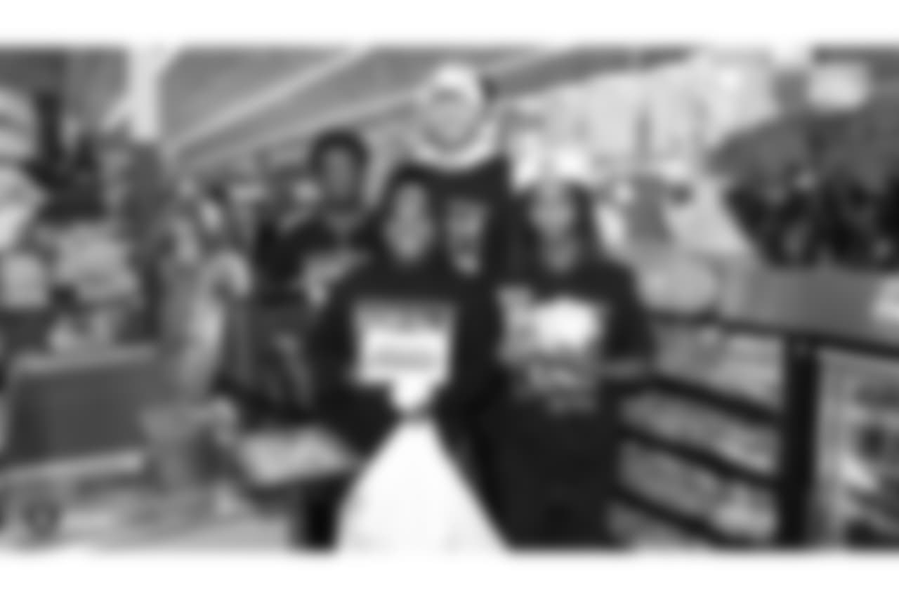 Donald Penn's SHOP WITH A JOCK gives 25 kids from the East Oakland Youth Development Center a chance to fulfill their holiday wish list by receiving a $300 Walmart gift card and a chance to go on an shopping spree with Oakland Raiders tackle Donald Penn at Walmart, Tuesday, December 18, 2018, in San Leandro, California. Joining tackle Donald Penn are guard/tackle Kelechi Osemele, guard Cameron Hunt, tackle Brandon Parker, tackle Jamar McGloster, punter Johnny Townsend, fullback Ryan Yurachek, tight end Darren Waller, tight end Paul Butler, and defensive tackle Clinton McDonald.